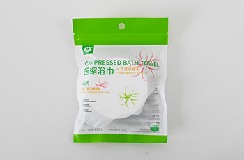 DISPOSABLE COMPRESSED BATH TOWEL